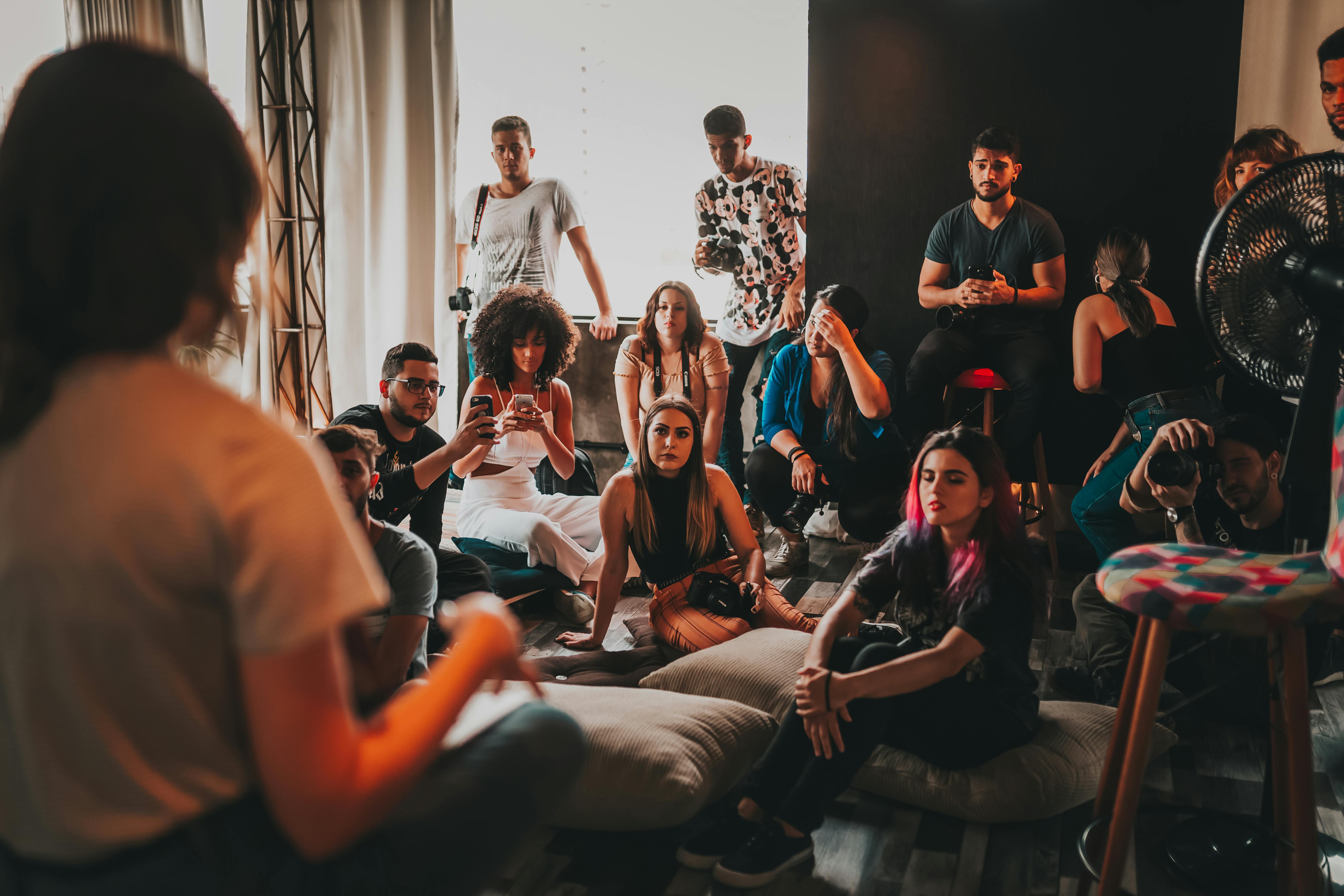 Community gathering — people seated together in an intimate setting